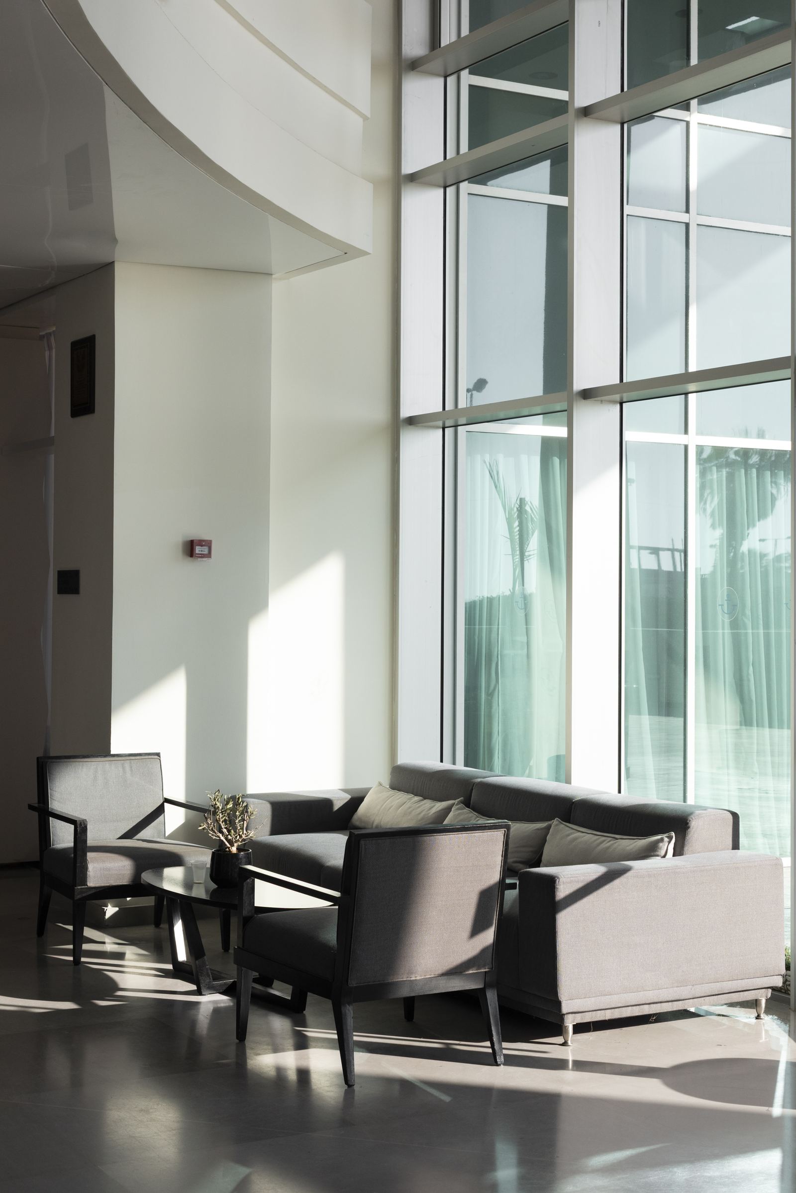 Modern lobby with grey sofas